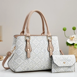 Elegantes Eimertaschen-Set mit Blumenmuster, Ledergriffen und goldener Hardware