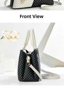 Detailed front view of the large tote bag featuring DH monogram and ivory leather straps