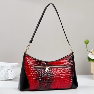 Luxury red faux snakeskin leather baguette bag with high-gloss finish and gold zipper