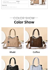 Detail view of stylish pleated handbag with heart charm and multi-color options