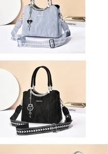 Detail of vintage tote bags with crinkled texture, heart charms and wide patterned straps