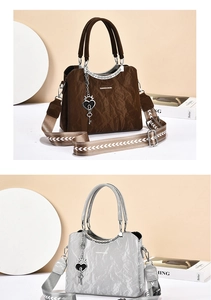 Detail of crinkled texture tote with wide woven strap and heart charm in two colors