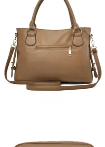 Detail view of brown pebbled PU leather tote bag with back zipper and gold hardware