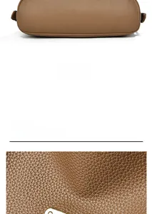 Detail view of brown lychee grain leather texture and bag bottom structure on a tote