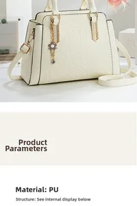 Detail of cream PU leather handbag featuring woven texture and gold floral charm