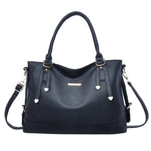 Classic black PU leather tote bag with gold metal plaque and adjustable shoulder strap