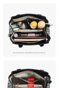 Interior layout of large striped tote bag with multiple compartments and organized storage