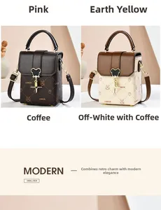 Detail of small crossbody box bags with monogram prints and unique metal mouse magnetic clasp