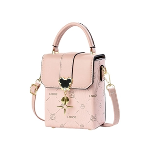 Pink textured leather mini crossbody bag with cartoon print and Mickey silhouette clasp