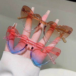 Cute heart-shaped sunglasses for kids in gradient orange-brown and pink-blue PC frames