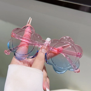 Lunettes de soleil enfant en forme de fleur avec verres dégradés rose et bleu