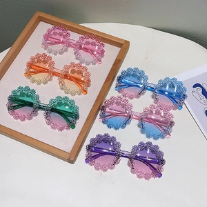 Colorful kids floral sunglasses with round frames and gradient lenses for summer beach