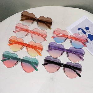 Kids heart shaped rimless sunglasses in multiple candy gradient colors for fashion parties