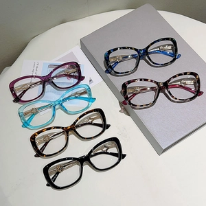 Detailed top view of assorted stylish acetate cat-eye glasses frames in multiple colors