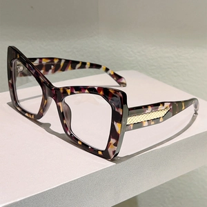Fashion cat eye blue light glasses with colorful tortoiseshell frames and gold metal detail