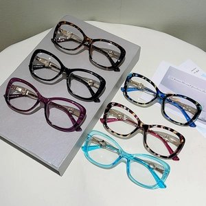 Cat eye blue light glasses frames in various colors including tortoiseshell and marble
