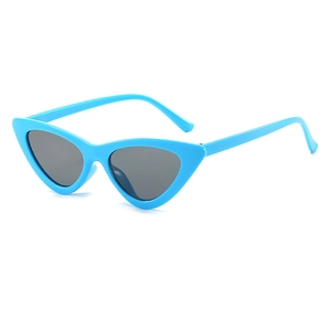 Side view detail of trendy sky blue triangle cat eye sunglasses with dark grey lenses