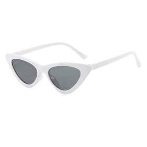 Side view of trendy white plastic cat-eye sunglasses with dark grey tinted lenses