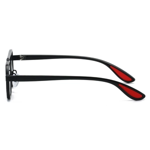 Detailed side view of hexagonal metal sunglasses with red accent on black temple tips