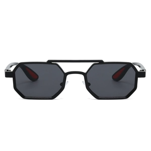 Detail of hexagonal metal sunglasses with a unique double bridge and black-red frame