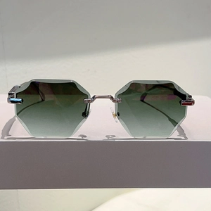 Modern rimless octagonal sunglasses with gradient green lenses and silver metal frames