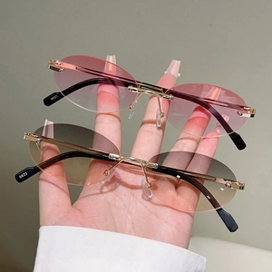 Frameless oval gradient sunglasses with gold metal temples in pink and brown tints