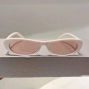 Retro oval small frame sunglasses for women with cream white frame and translucent lenses