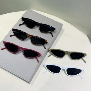 Five pairs of Y2K futuristic narrow cat-eye sunglasses in multiple stylish colors