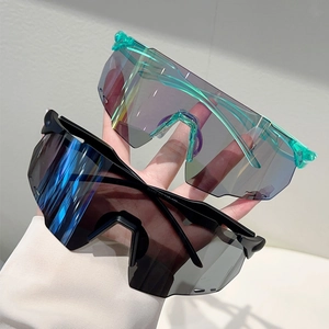 Close-up of sports sunglasses temples showing product model and size specifications