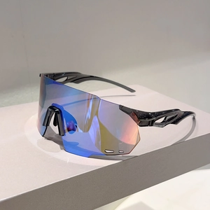 Detail of streamlined oversized sports sunglasses with blue and orange gradient mirrored lens