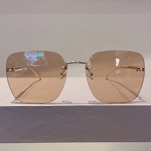 Lunettes de soleil carrées sans monture avec verres dégradés marron et branches dorées