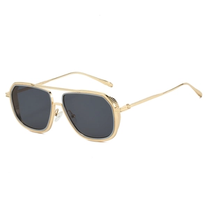 Classic pilot sunglasses with gold metal frame and dark lenses in three-quarter view