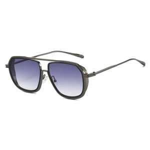 Detail of pilot metal sunglasses featuring a double bridge and vintage industrial side shields