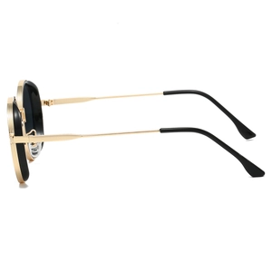 Side view of retro round sunglasses with black and gold metal frames and slim temples