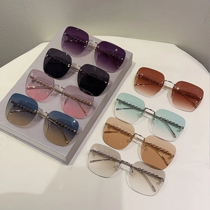 Lunettes de soleil carrées sans monture avec perles métalliques élégantes en huit couleurs