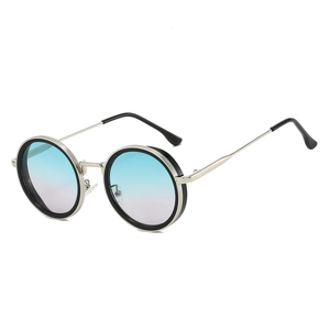 Detail of round vintage sunglasses with silver metal frame and blue-pink gradient lenses