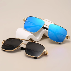 Close-up of metal double bridge sunglasses with blue mirrored and black lenses