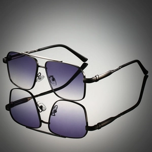 Close-up of black metal double bridge sunglasses with purple gradient lenses