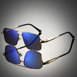 Detail of pilot metal double bridge sunglasses with reflective blue mirrored lenses