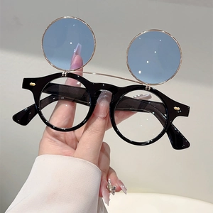 Retro flip-up round sunglasses with blue lenses and Mickey ear style punk frame