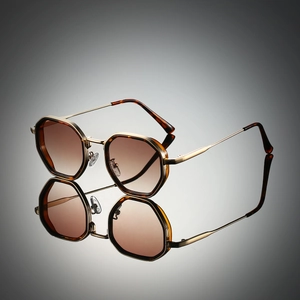 Steampunk polygonal gold metal sunglasses with brown gradient lenses and textured frame