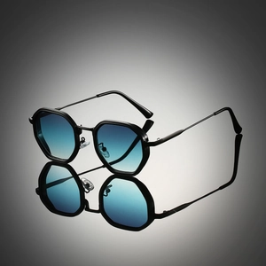 Detail view of steampunk polygon metal sunglasses with blue gradient lenses and nose pads