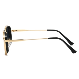 Detail view of steampunk metallic polygon sunglasses featuring golden textured frame edges