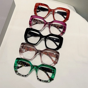 Top view of large cat-eye glasses frames in multiple leopard and solid colors