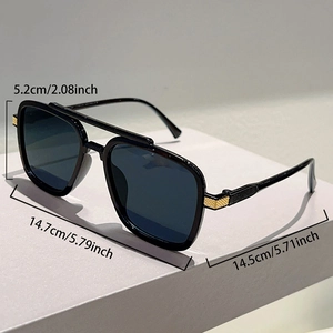 Detail showing oversized black frame sunglasses with dimensions and gold hinge metalwork