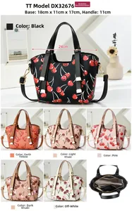 Detailed view of dumpling tote bag with cherry print in six colors and interior structure