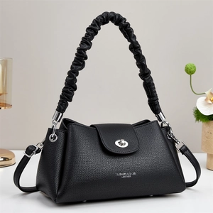 Black mini leather dumpling bag with wave pleat handle and silver twist lock closure