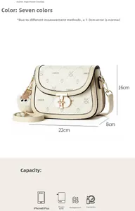 Detailed dimensions of the ivory saddle bag with quilted pattern and plush charm