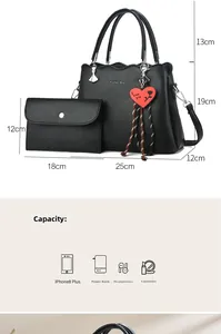 Detailed size specifications for the black lychee leather tote bag with heart charm