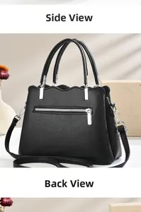 Detail of black pebbled leather tote bag with scalloped edges and silver hardware
